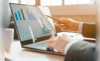 A laptop with diagrams and graphics on the screen